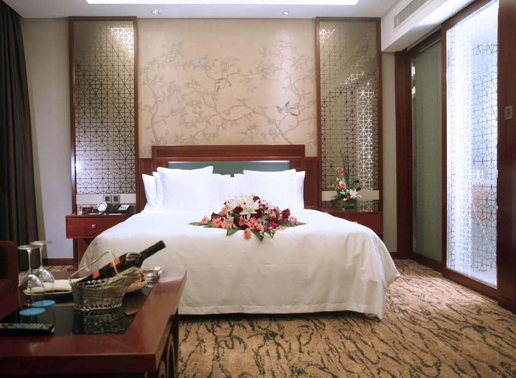 Gloria Grand Hotel Wuxi Wuxi  Zimmer foto